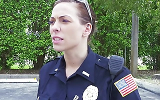 Feminine cops pull over black suspect and suck his cock